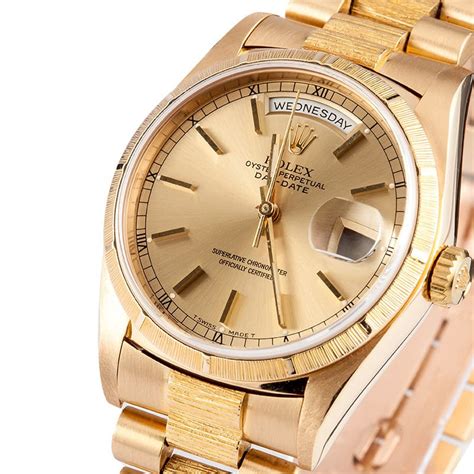 pre owned rolex president gold.